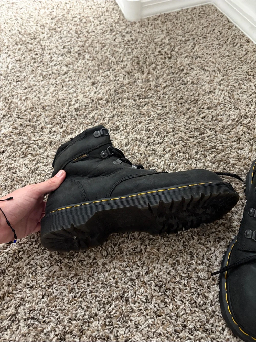 Dr. Martens Black Leather Work Boots with Yellow Stitching